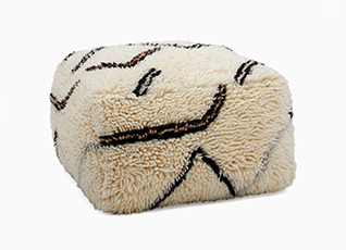 Open box wanderer shag pouf in stock ready to ship