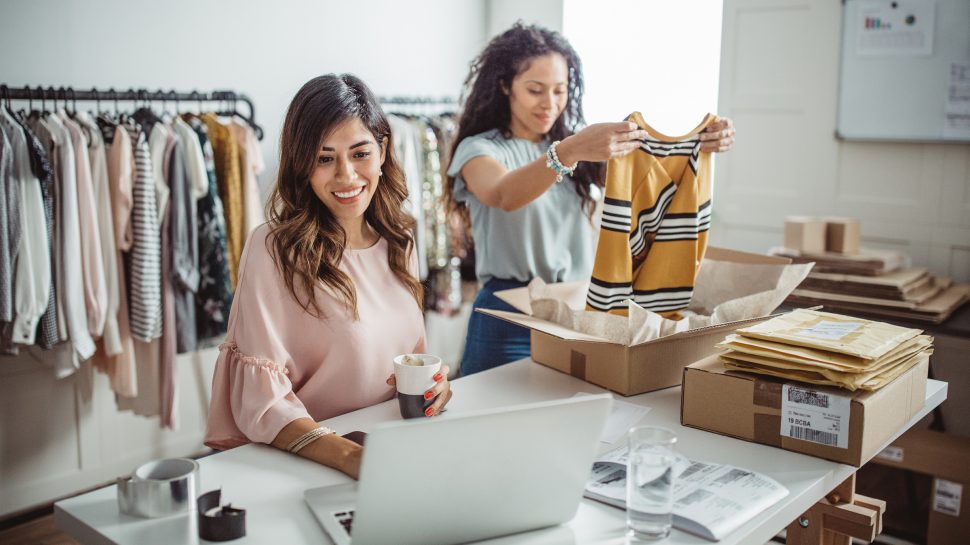 Photo two women selling online small business clothes. Jpg. Auspostimage. 970 0. 169. Medium