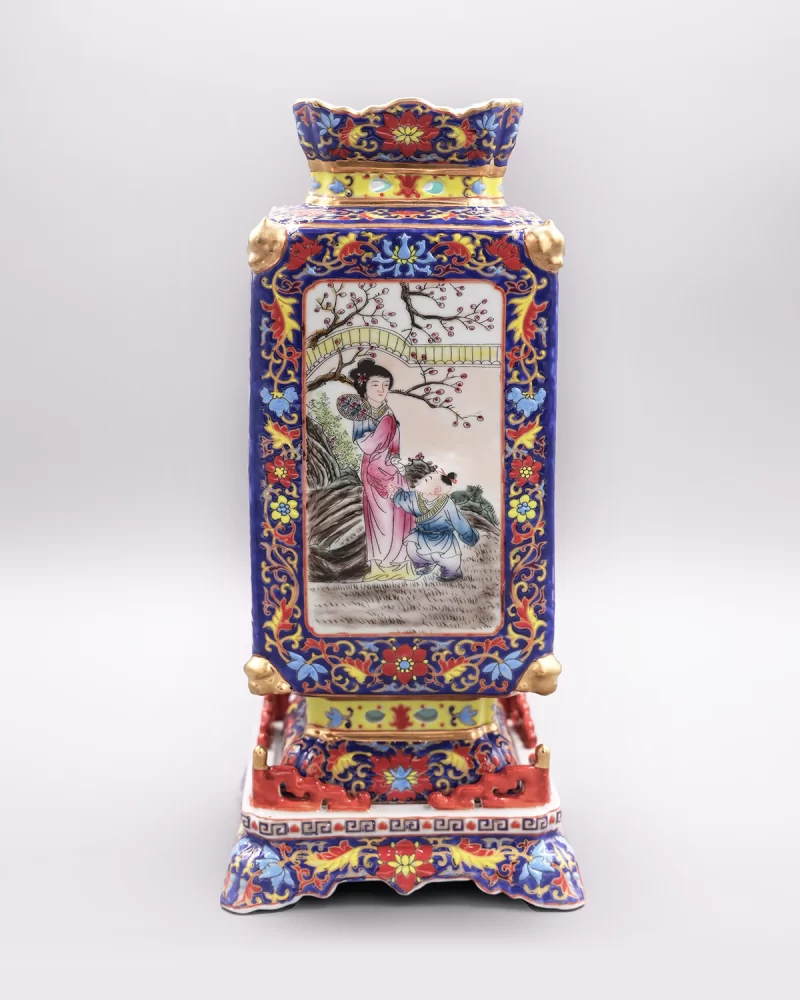 a colorful vase with a painting on it