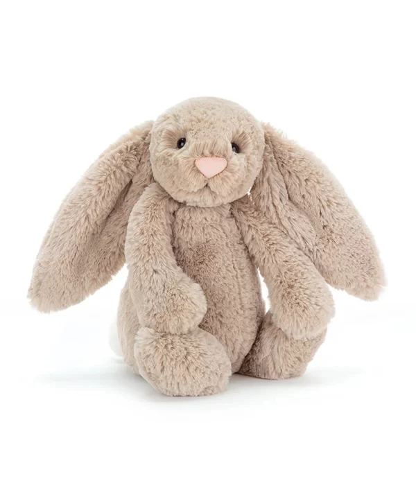 a stuffed animal rabbit on a white background